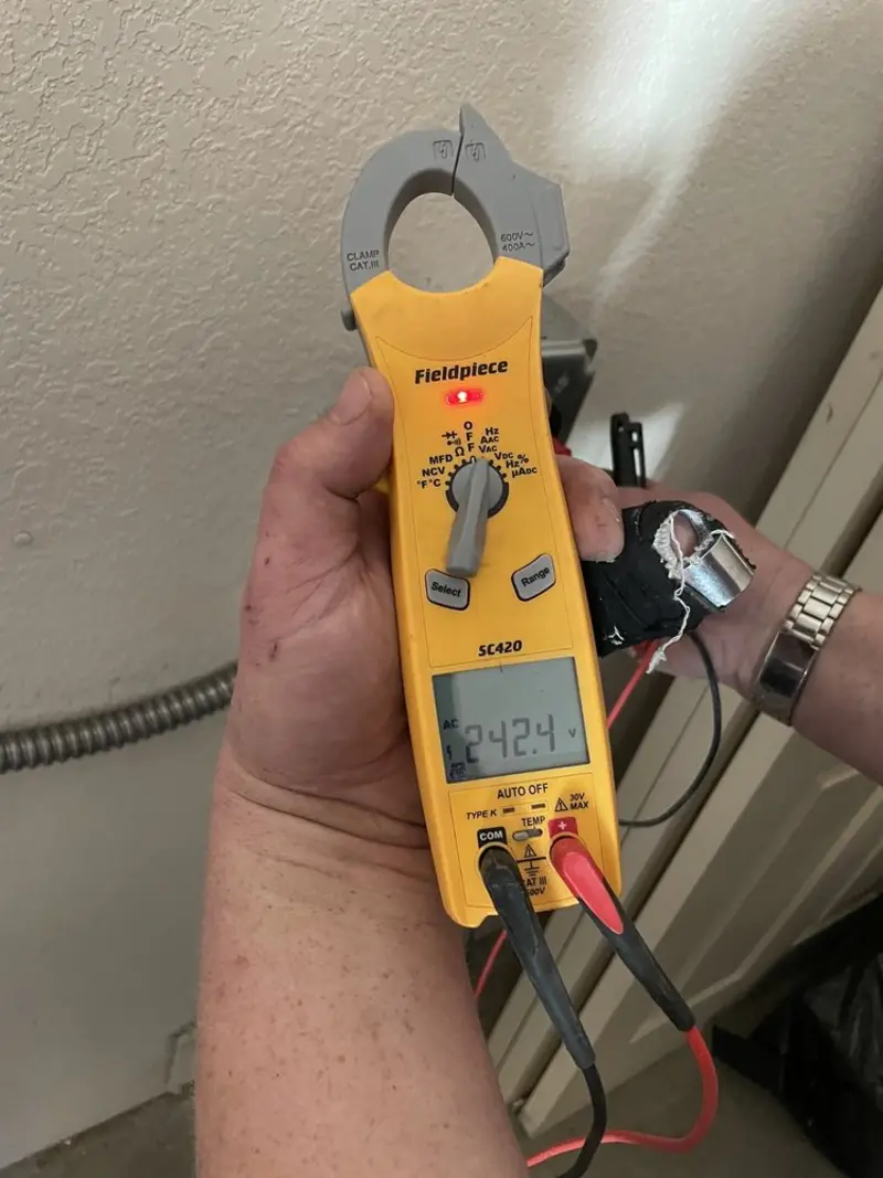 Voltage testing with clamp meter during Aluminum Wiring Replacement in Northlake